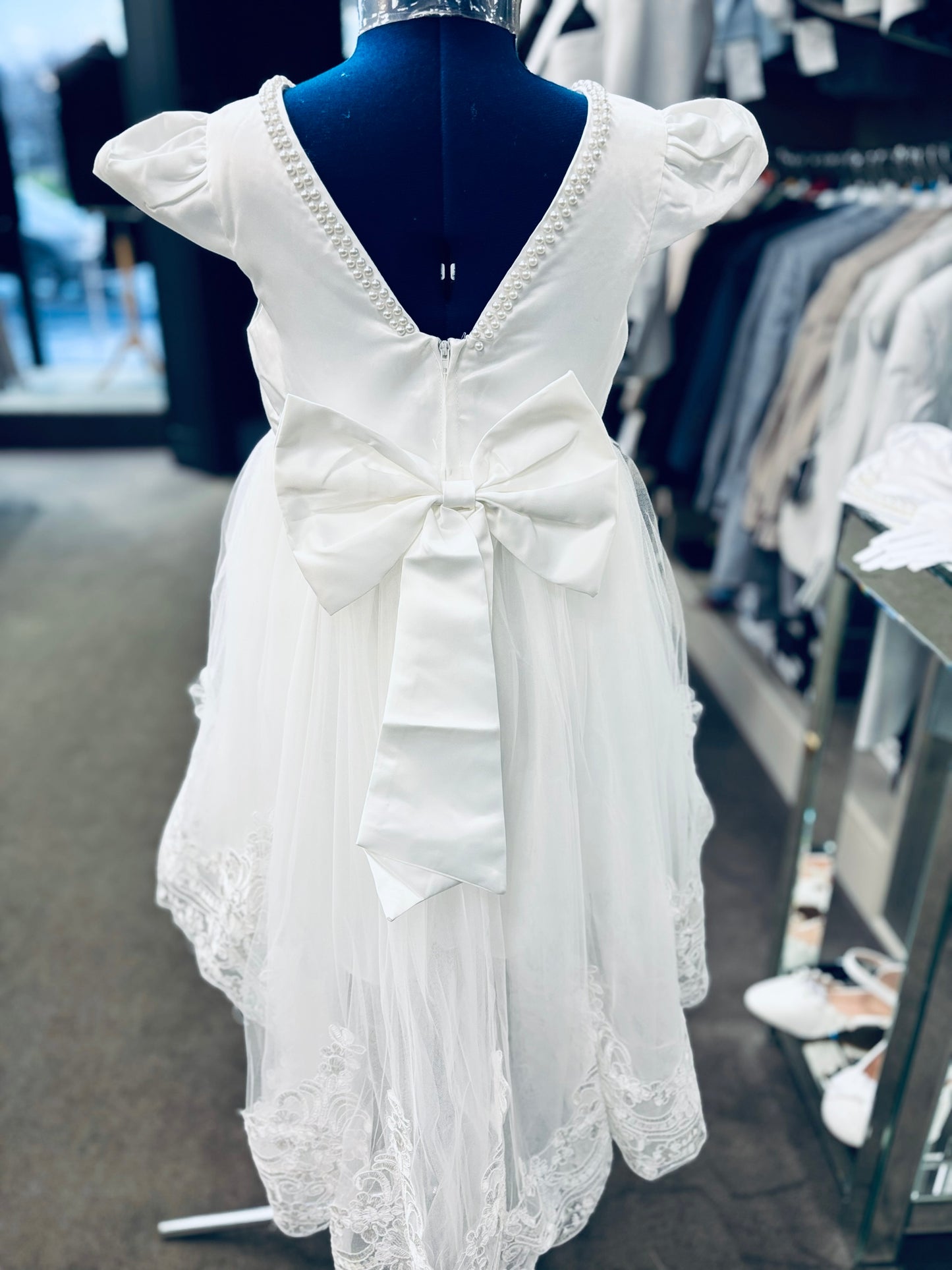 A knee length delight communion dress