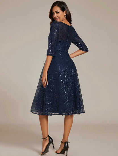 The Classic Sparkle Midi Dress